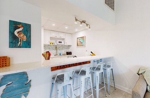 Villa Sabine Condo | Charming coastal condo with water views, great location, balcony, WiFi, A/C