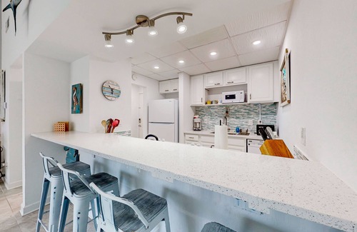 Villa Sabine Condo | Charming coastal condo with water views, great location, balcony, WiFi, A/C