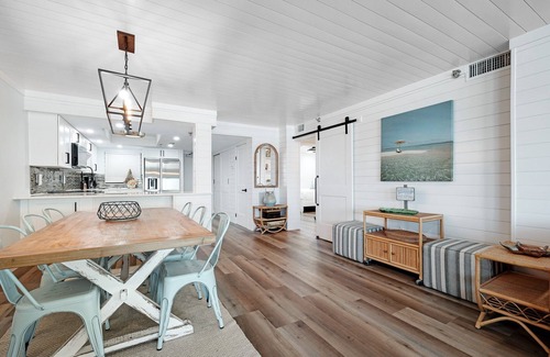 New Smyrna Beach Condo | Direct oceanfront condo with a large balcony, heated pool, and beach access