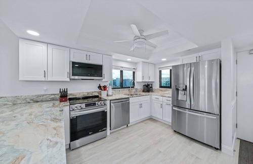 New Smyrna Beach Condo | Direct oceanfront southern corner condo with large wrap-around balcony and heated pool