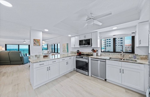 New Smyrna Beach Condo | Direct oceanfront southern corner condo with large wrap-around balcony and heated pool
