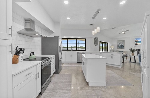 Bonita Bay House | DolphINN View Getaway - Bayfront Escape w/ Pool, Dock & 8-Min Walk to Beach