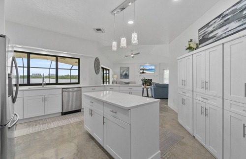 Bonita Bay House | DolphINN View Getaway - Bayfront Escape w/ Pool, Dock & 8-Min Walk to Beach
