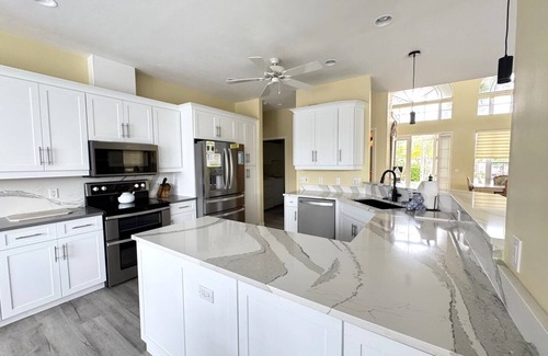 Marco Island House | Enjoy Sunny warm days, lounging poolside at this home