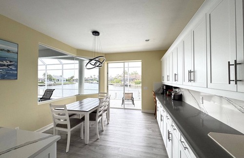 Marco Island House | Enjoy Sunny warm days, lounging poolside at this home