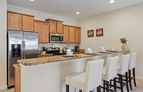 West Kissimmee House | Family-Friendly 4BR Townhome w/Private Pool & BBQ – 20 Mins to Disney!