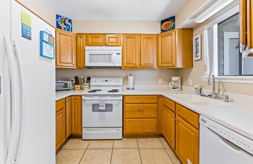 Miramar Beach House | Family-friendly townhouse w/shared pool, partial ocean view, & high-speed WiFi