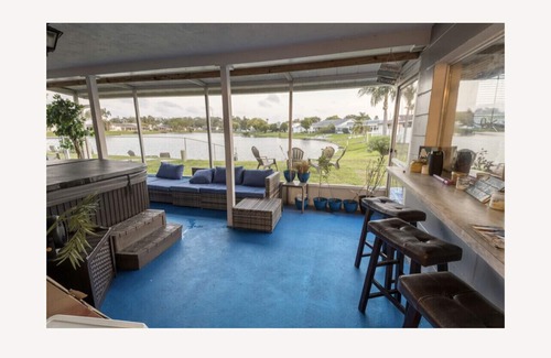 Holiday House | Florida Family Friendly, Waterfront Getaway Near Beaches and Parks!