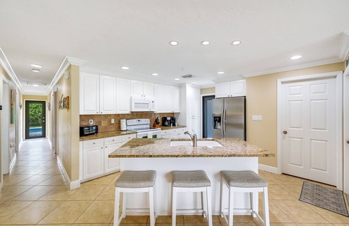 Naples Park House | *GEM!*3 BR BEACH HOUSE w/HEATED POOL, short ride to the beach!