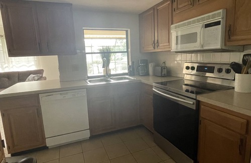 East Naples House | Great family home with a new sparkling pool,lovely lake view, 5 Minutes to beach