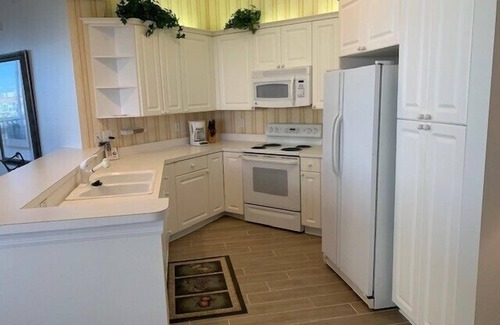 Vanderbilt Beach Condo | Great location! 2 blocks from the beach with beautiful bay views - REG 3-501