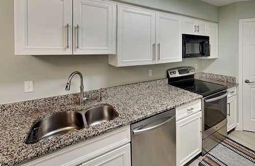 Butler Beach Condo | Ground Floor Condo w. Patio, Community Pools + Beach Access