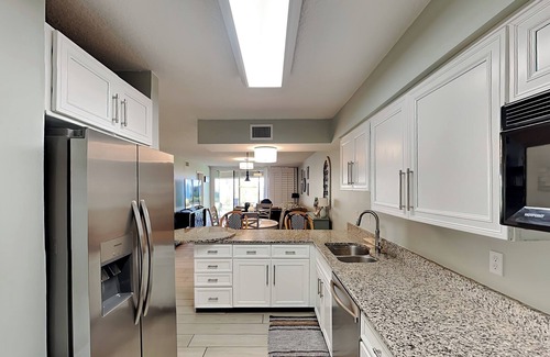Butler Beach Condo | Ground Floor Condo w. Patio, Community Pools + Beach Access