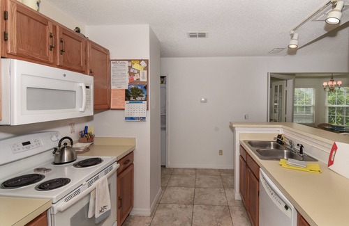New Smyrna Beach Condo | Ground floor Sun Beach Club - Walking distance to car free beach. SBC884