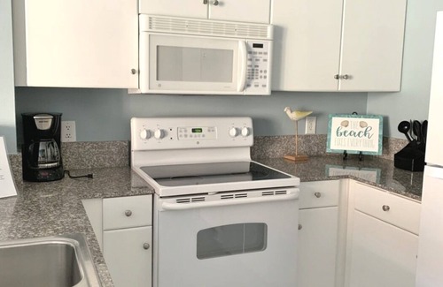 Panama City Beach Condo | Gulf Front Getaway Great View of Pool & Beach From Balcony With Reserve Parking