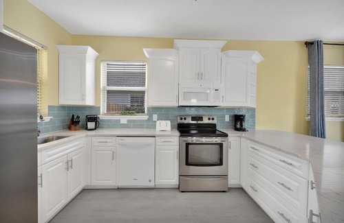 Jacksonville Beach House | Heated Pool Pet friendly Home