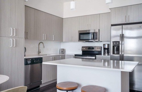 Poinciana Park Apartment | Hip Ponciana Park 1BR w/Gym, W/D & Pool, steps to WF, by Blueground