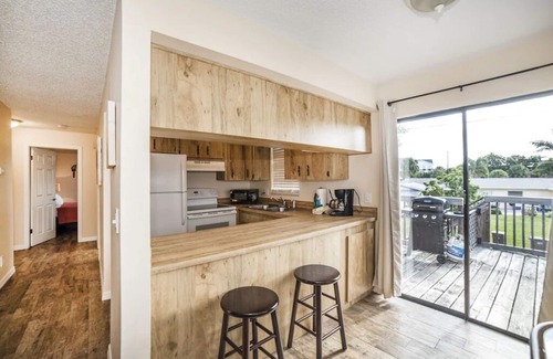 Indian Rocks Beach Apartment | Just 1 block from the sugar white sand beach. Charming 2 bedroom Beach suite with large private deck . Walk To Restaurants, Shops And The Beach
