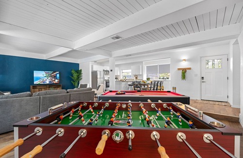 Seminole House | Just WOW! + Heated Pool + 10 Mins to Beach + Games + Foosball & More!