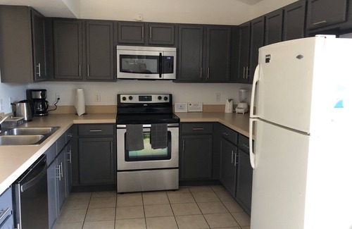 Lake Wilson Preserve House | LAST MINUTE DEALS 4 Bed/3 Bath Villa. South-facing private pool.