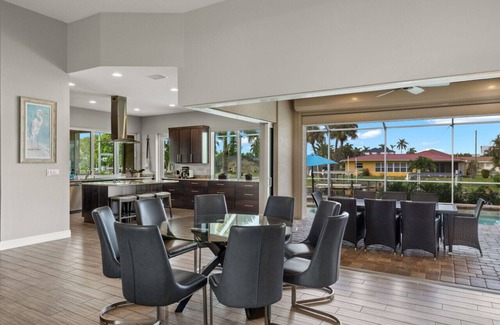 Yacht Club House | Luxury home w/2 suites, LARGE pool, spa, lanai. Quick gulf access! 5 Bikes! EV!