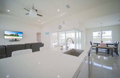 Diplomat House | Luxury Living at Cape Coral-Heated Pool 3 Bedroom-3 Bathroom-Fresh Water Canal.