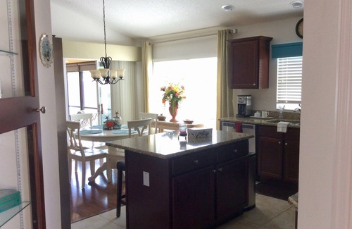 Gilchrist House | Luxury & Relaxation at This AMAZING Pool home with Golf Cart & BBQ Grill!