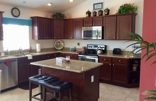 Gilchrist House | Luxury & Relaxation at This AMAZING Pool home with Golf Cart & BBQ Grill!