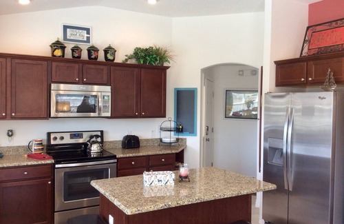 Gilchrist House | Luxury & Relaxation at This AMAZING Pool home with Golf Cart & BBQ Grill!