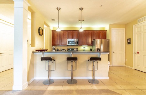 Florida Central Atlantic Coast Condo | Minutes to everything. Desirable Ground Floor Condo in Vista Cay |Lanai |Across from Epic Universe