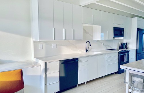 Placida Condo | MODERN BEACHFRONT RETREAT: Stunning Views+ Heated Pool+ Ferry Access+ Parking!