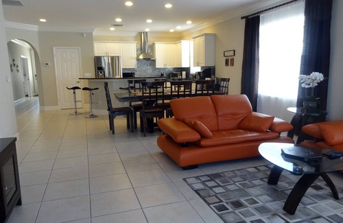 Naples Park House | Modern villa, short walk to the beach, screened heated pool