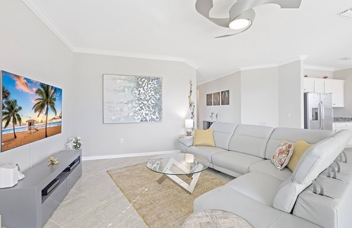 Naples House | Modern waterfront home in Artesia w/pool/gym