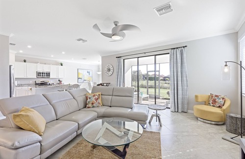 Naples House | Modern waterfront home in Artesia w/pool/gym
