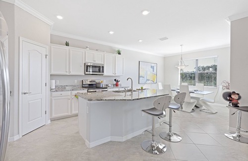 Naples House | Modern waterfront home in Artesia w/pool/gym