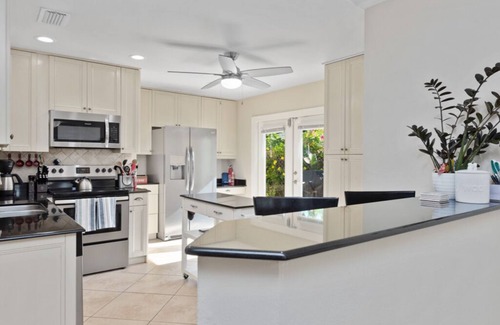 Naples Park House | Naples Park Pool & Spa Home 1 Mile to Beach and Tropical Oasis Fenced Yard.