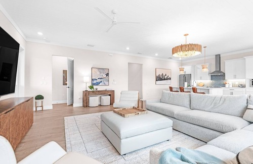 South Island House | NEW Build Modern Beach Beauty on Canal with Heated Pool 150 yds to beach Access