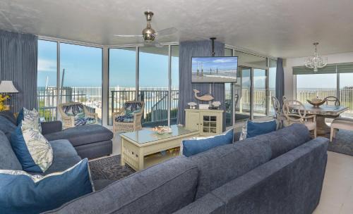 Bethune Beach Apartment | Ocean Condo 104 ~ Ground Floor Corner Condo with wrap around balcony Walk right out to Pool