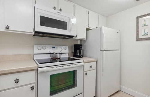 Amelia City Condo | Oceanfront Condo - 2 pools - Private Patio - Short walk to The Ritz Carlton