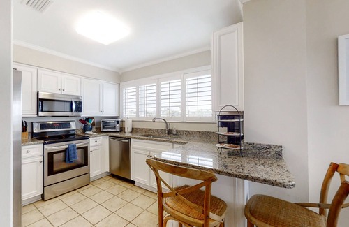 Amelia City House | Oceanfront townhome with lovely ocean view, pool, fast WiFi & W/D