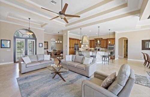 Marco Island House | Opulent waterfront home with pool, spa, dock and deck