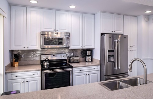 Hunt Club Condo | PGA National Home on Squire Golf Course 180º Water Views by Guaranteed Rental™