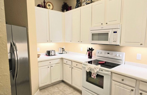 Bahama Bay Condo | Platinum rated 2BR ground floor next to pool big screen TVs, Huge patio, wifi