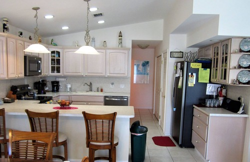 Key Colony Beach House | Quick Boating Tiki Hut, Canal, Pool club, Dock and Near Open Water!