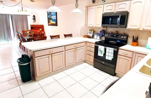 Key Colony Beach House | Quick Boating Tiki Hut, Canal, Pool club, Dock and Near Open Water!