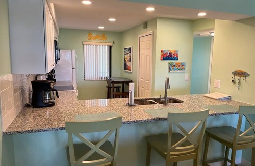 Cocoa Beach Condo | Remodeled! Granite! Sandcastles 2 BR Direct Space Coast OCEANVIEW 704!