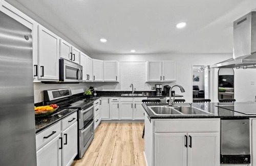 Indian Trails House | Reunion - Sleeps 26 hot tub 10 br 8 ba 6 mile beach