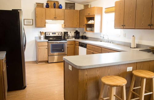 St. George Island House | Rosemary is secluded, fenced, pet friendly with kayaks, close to beach and bay!