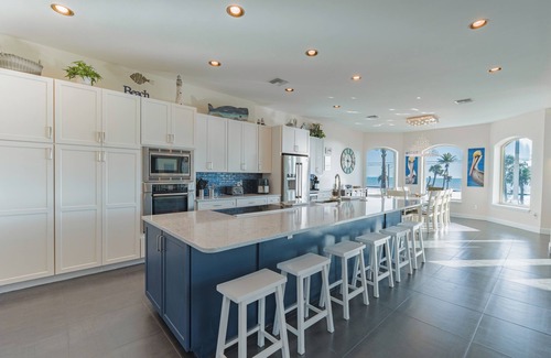 Mid Island House | Sabal Palms is a spectacular luxury pool home across from beach with Gulf view