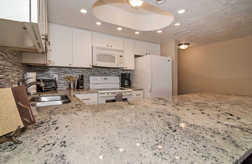 Indian Shores Condo | SALE! Palm Suite at Casa Gia Condo direct beach front/Pool & hot tub open!